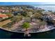 Waterfront lot with mature trees and a private dock, offering picturesque bay views at 38 Ladoga Ave, Tampa, FL 33606