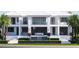Waterfront residence with a modern pool design, waterfall feature, inviting balconies, and elegant landscaping at 38 Ladoga Ave, Tampa, FL 33606