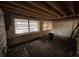 View of basement interior featuring two windows and unfinished walls at 4050 Iris N St, St Petersburg, FL 33703