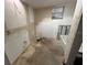 View of bathroom interior showing exposed wall and new bathtub at 4050 Iris N St, St Petersburg, FL 33703