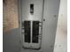 Close-up of an electrical panel with multiple switches and labels for efficient power management at 4050 Iris N St, St Petersburg, FL 33703