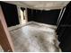 View of an enclosed sunroom with tiled floor and covered windows at 4050 Iris N St, St Petersburg, FL 33703