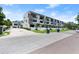 Exterior view of modern townhomes with ample parking and landscaped grounds at 4515 W North A St # 6, Tampa, FL 33609