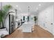 Bright and airy kitchen featuring a large island, modern appliances, and stylish pendant lighting at 4515 W North A St # 6, Tampa, FL 33609