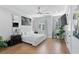 Serene main bedroom with hardwood floors, neutral decor, and large windows at 4515 W North A St # 6, Tampa, FL 33609