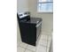 Modern black electric range oven is featured in the kitchen next to a window at 4705 Murray Hill Dr, Tampa, FL 33615