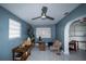 Cozy living room featuring tile flooring, modern ceiling fan, and comfortable seating area with natural light at 4705 Murray Hill Dr, Tampa, FL 33615