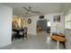 Open floor plan living room featuring tile floors and a neutral color scheme at 4705 Murray Hill Dr, Tampa, FL 33615