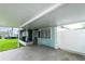 View of the cozy porch with chairs and a welcoming mat at 4705 Murray Hill Dr, Tampa, FL 33615