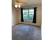 Cozy bedroom with a window offering pleasant outside views at 500 Belcher S Rd # 109, Largo, FL 33771