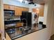 Well-equipped kitchen featuring a breakfast bar and stainless steel appliances at 500 Belcher S Rd # 109, Largo, FL 33771