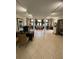Spacious lobby featuring tile floors, columns, elegant furnishings, and large windows offering natural light at 500 Belcher S Rd # 109, Largo, FL 33771