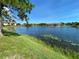 Community pond featuring fountain and bridge at 500 Belcher S Rd # 109, Largo, FL 33771