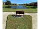 Scenic view of the pond with walking bridge in community at 500 Belcher S Rd # 109, Largo, FL 33771