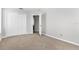 A spacious bedroom with carpet flooring offers ample closet space and natural light at 5015 58Th E Ter, Bradenton, FL 34203