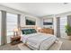 Well-decorated main bedroom with a comfortable bed, stylish artwork, and plenty of natural light at 5015 58Th E Ter, Bradenton, FL 34203