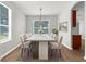 Dining room with long dining table set for a dinner party at 5015 58Th E Ter, Bradenton, FL 34203
