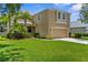 Well-manicured lawn and landscaping enhance the curb appeal of this beautiful home at 5015 58Th E Ter, Bradenton, FL 34203