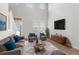 Modern living room with high ceilings and stylish furnishings at 5015 58Th E Ter, Bradenton, FL 34203