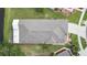 An aerial view showcases the roof and landscaping of this well-maintained home at 5131 Gato Del Sol Cir, Wesley Chapel, FL 33544