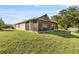 This home boasts a screened lanai overlooking a well-maintained lawn and beautiful backyard scenery at 5131 Gato Del Sol Cir, Wesley Chapel, FL 33544