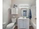 Cozy bathroom featuring a white vanity and nautical-themed decor at 5131 Gato Del Sol Cir, Wesley Chapel, FL 33544
