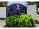 Edgemoor Neighborhood sign featuring an artistic tree emblem, set against a backdrop of lush greenery at 565 55Th Ne Ave, St Petersburg, FL 33703