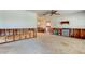 Spacious living room featuring a ceiling fan, and unfinished drywall, ready for your personal touch at 565 55Th Ne Ave, St Petersburg, FL 33703