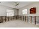 Well-lit room with mounted shelves, ideal for storage and organization at 565 55Th Ne Ave, St Petersburg, FL 33703