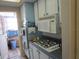 Efficient kitchen featuring modern appliances, gas range, and ample counter space for meal preparation at 5970 21St N St # 15, St Petersburg, FL 33714