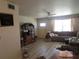 Comfortable living room featuring a TV and entertainment center, plenty of natural light, and a cozy atmosphere at 5970 21St N St # 15, St Petersburg, FL 33714