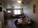 Open-concept living space with plenty of room and an adjacent dining area, offering flexible layout options at 5970 21St N St # 15, St Petersburg, FL 33714