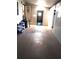 Enclosed back patio with an entrance to inside and outside and electrical connections at 6443 Midland St, Zephyrhills, FL 33542