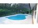 Enjoy outdoor living in this screened-in pool area, perfect for relaxation and entertainment at 6605 Foxmoor Dr, Zephyrhills, FL 33542