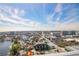 Cityscape view overlooking neighborhood streets, a lake, and apartment complexes on a bright day at 777 3Rd N Ave # 1503, St Petersburg, FL 33701