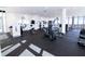 Bright gym featuring modern equipment, floor-to-ceiling windows and mirrors for a great workout experience at 777 3Rd N Ave # 1503, St Petersburg, FL 33701