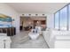Spacious living room showcasing an open layout, modern decor, and scenic city views at 777 3Rd N Ave # 1503, St Petersburg, FL 33701