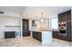 Spacious kitchen featuring an island, stainless steel appliances, and custom cabinetry at 777 3Rd N Ave # 1603, St Petersburg, FL 33701