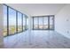 Bright, open living room with floor-to-ceiling windows offering city views at 777 3Rd N Ave # 1603, St Petersburg, FL 33701