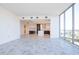 Open-concept living space with modern kitchen and large window view at 777 3Rd N Ave # 1603, St Petersburg, FL 33701