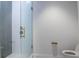 Stylish bathroom featuring glass enclosed shower, gray tile and gold hardware at 777 3Rd N Ave # 1704, St Petersburg, FL 33701