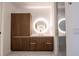 Modern bathroom with wood cabinets, and decorative lighting at 777 3Rd N Ave # 1704, St Petersburg, FL 33701