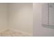Hallway corner showcasing marble tile flooring and white walls at 777 3Rd N Ave # 1704, St Petersburg, FL 33701