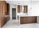 Modern kitchen with sleek cabinets, center island, and stainless steel appliances at 777 3Rd N Ave # 1704, St Petersburg, FL 33701