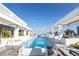 Rooftop pool and lounge area with sunbeds and city views at 777 3Rd N Ave # 1704, St Petersburg, FL 33701