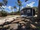 Explore a partially fenced backyard space, perfect for outdoor enjoyment at 8018 Mulberry St, Tampa, FL 33604