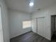 Bright bedroom featuring modern flooring, closet and a window at 8018 Mulberry St, Tampa, FL 33604