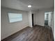 This bedroom features a closet and a window at 8018 Mulberry St, Tampa, FL 33604