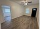Spacious living room featuring new floors, fresh paint, and abundant natural light at 8018 Mulberry St, Tampa, FL 33604