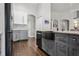 Modern kitchen with granite countertops, stainless steel appliances, and seamless access to other parts of the home at 803 Brooker Village Cir, Lutz, FL 33548